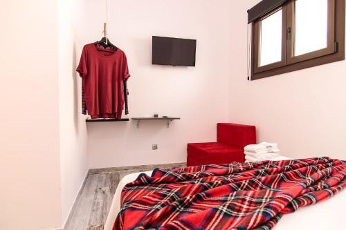 Foto de una habitación de The 8 Rooms House