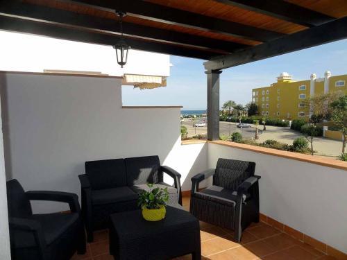 Foto de una habitación de Apartamento VenAVera Playa JARDINES N2-1D