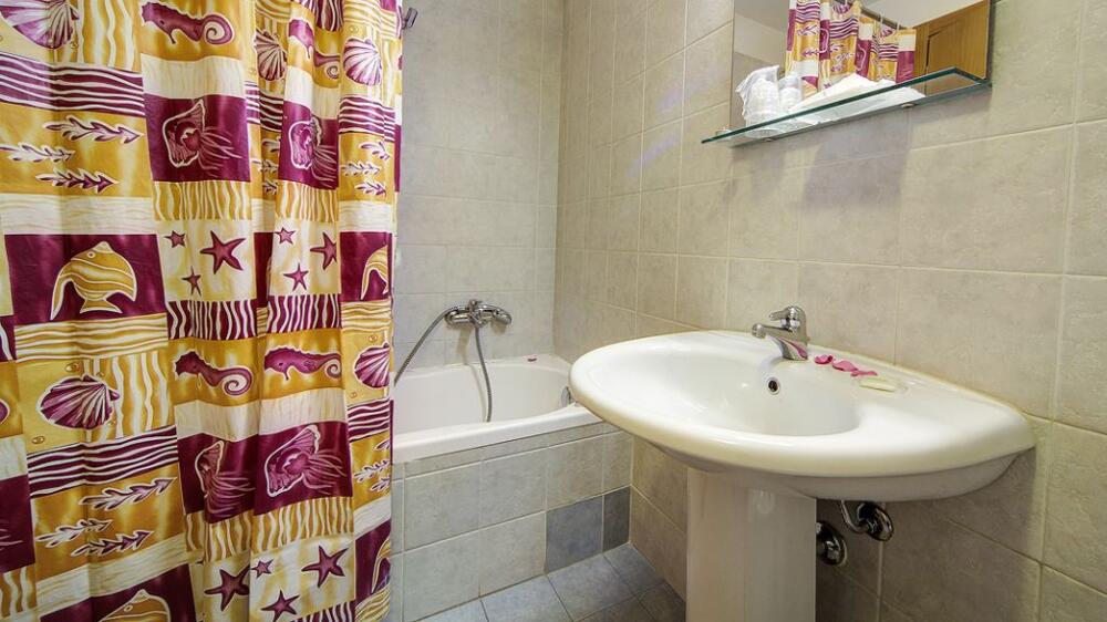 Foto del baño de Aparthotel Residence Le Corniole