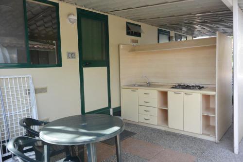 Foto de una habitación de Camping Village Torre Pendente