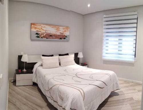 Foto de una habitación de Cervantes Apartamentos