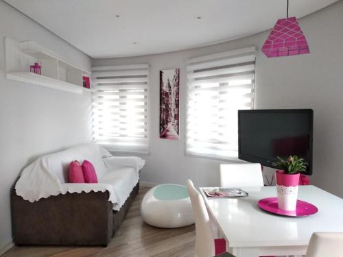 Foto de una habitación de Cervantes Apartamentos