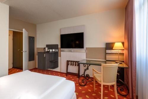 Foto de una habitación de Mercure Hotel Hannover City