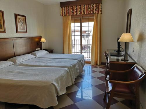 Foto de una habitación de Hotel Avenida Tropical by Bossh Hotels