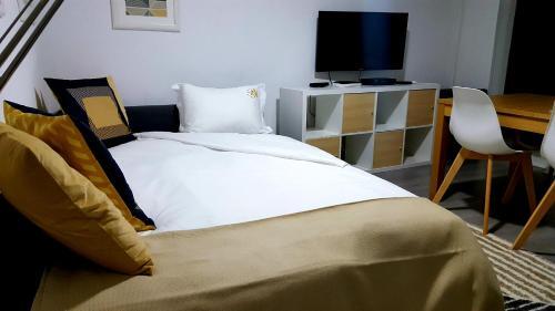 Foto de una habitación de Aparthotel Posh Residences