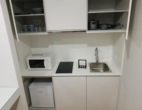 Foto de una habitación de Basto Vila Hotel