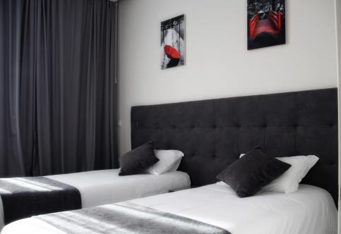 Foto de una habitación de Basto Vila Hotel