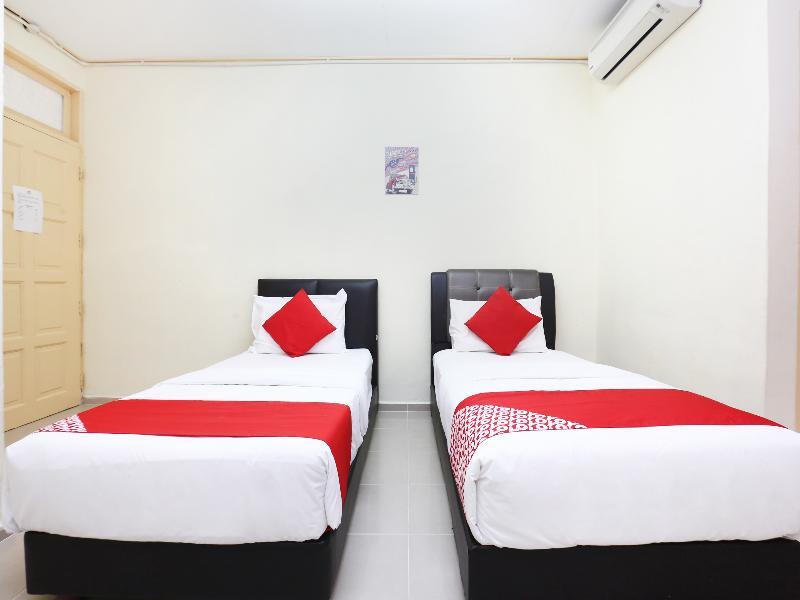 Foto de una habitación de OYO 89640 Hotel Pelangi Marang