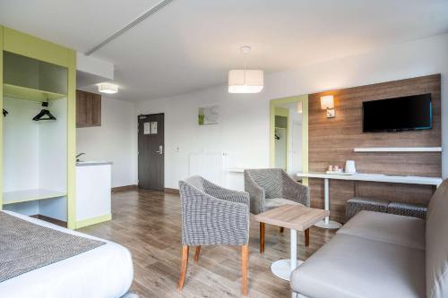 Foto de una habitación de Hotel Comfort Suites Universités Grenoble Est