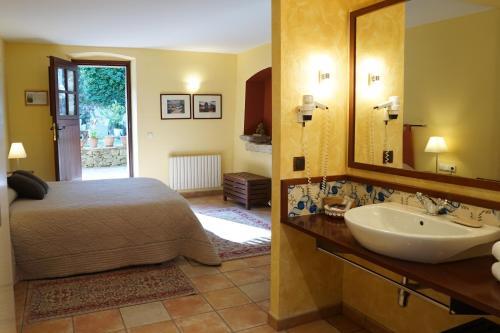 Foto de una habitación de Hotel La Sala de Camós