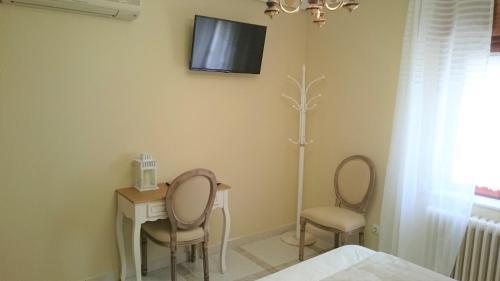 Foto de una habitación de Casa de Huéspedes Vecinodecerbantes