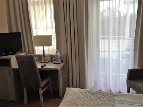 Foto de una habitación de Hotel Rosengarten
