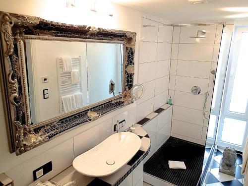 Foto del baño de Hotel Loccumer Hof