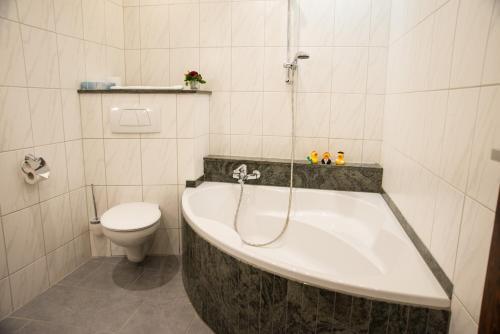 Foto del baño de Hotel Hellers Krug