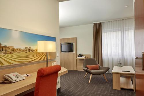 Foto de una habitación de H+ Hotel Darmstadt