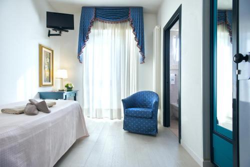 Foto de una habitación de Hotel Terme Olympia