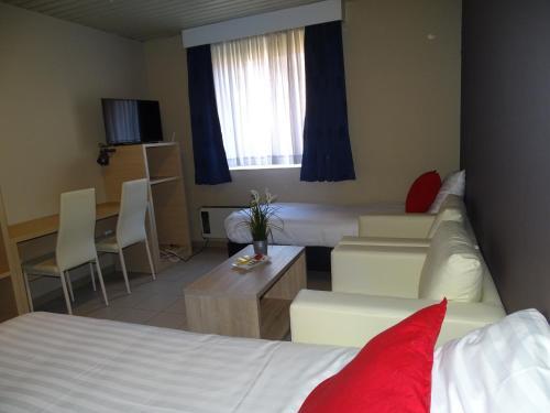 Foto de una habitación de Apartamentos Budget Flats Leuven