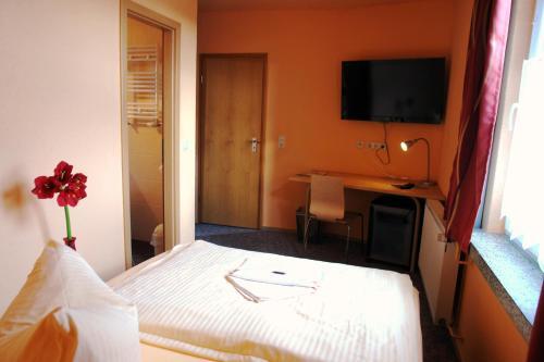 Foto de una habitación de Hotel-Pension Grüne Linde