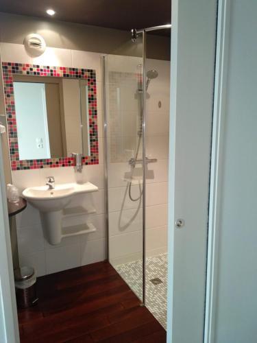 Foto del baño de Hotel La Corniche