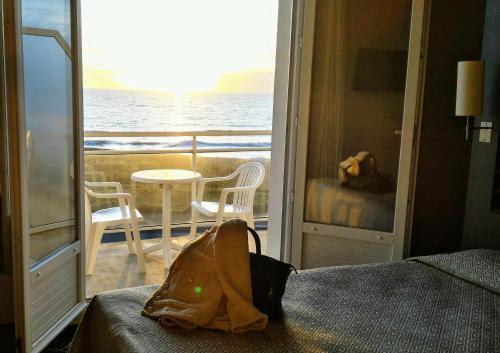 Foto de una habitación de Hotel La Corniche
