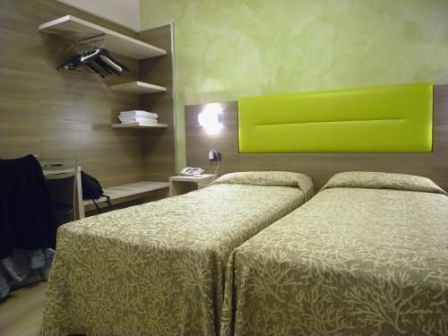 Foto de una habitación de Hotel Siena