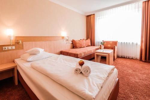 Foto de una habitación de Hotel an der Linah garni