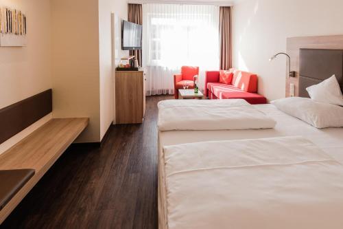 Foto de una habitación de Hotel an der Linah garni