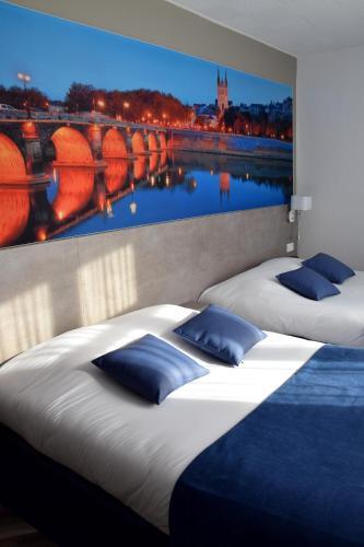 Foto de una habitación de Hotel Citotel L&amp;#039;univers