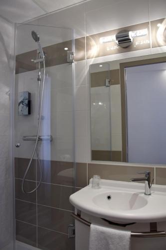 Foto del baño de Hotel Citotel L&amp;#039;univers