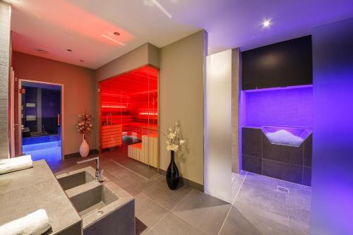 Foto del baño de Hotel am Hopfensee