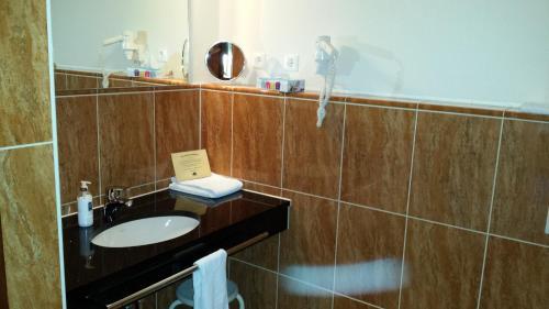 Foto del baño de Hotel Restaurant Am Pfauenhof