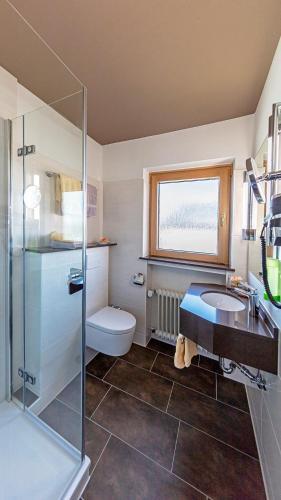 Foto del baño de Wittlers Hotel