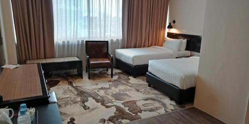 Foto de una habitación de Tun Fatimah Riverside Hotel