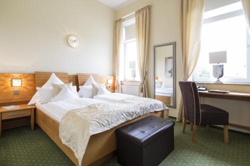 Foto de una habitación de Parkhotel Bilm im Glück am Stadtrand Hannovers