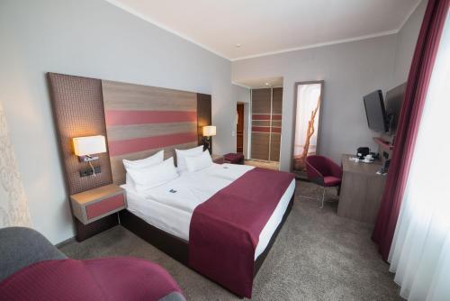 Foto de una habitación de Hotel Am Alten Strom