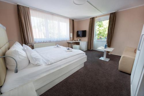 Foto de una habitación de Hotel Am Alten Strom