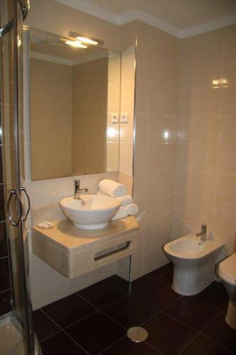 Foto del baño de Hotel Katia