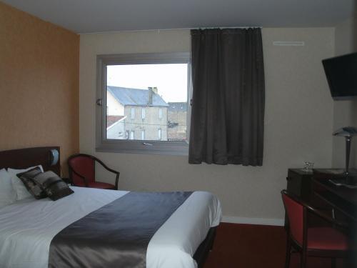 Foto de una habitación de Hotel Citotel Saint Jacques
