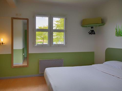 Foto de una habitación de Hotel ibis budget Redon