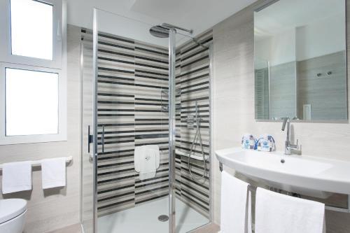 Foto del baño de Hotel Aurora