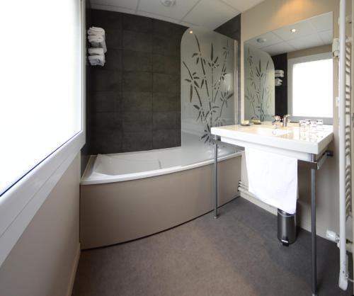 Foto del baño de Hotel Les Terrasses