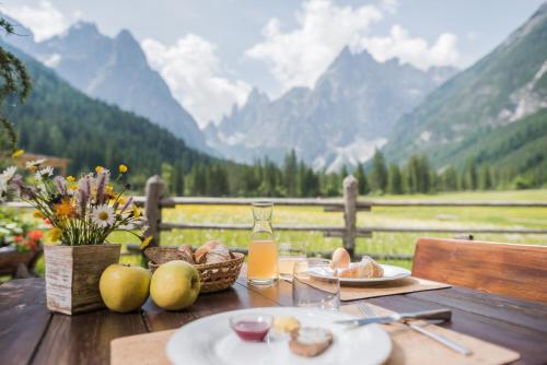 Foto de restauración de Hotel Dolomitenhof &amp;amp; Chalet Alte Post