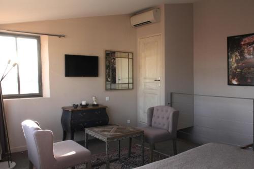 Foto de una habitación de Hôtel de l&amp;#039;Amphithéâtre