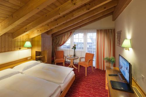 Foto de una habitación de Hotel Cheminee
