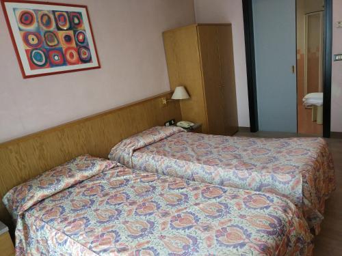Foto de una habitación de Hotel Raffaello