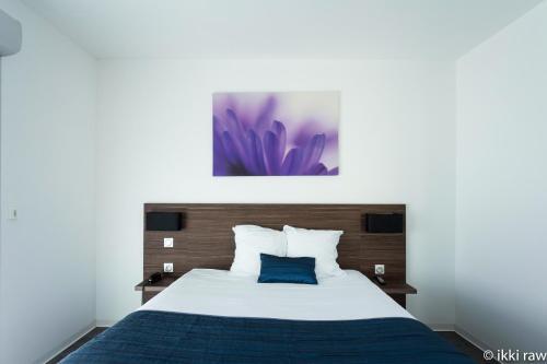 Foto de una habitación de Hotel Libera Caen Colombelles