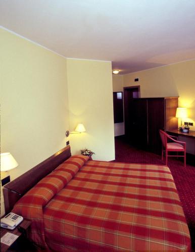 Foto de una habitación de Hotel Al Ponte Garnì