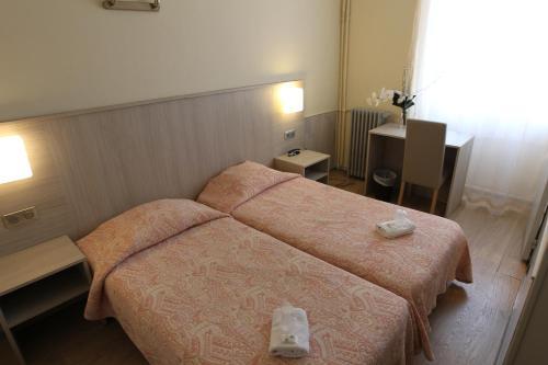 Foto de una habitación de Hotel de La Paix