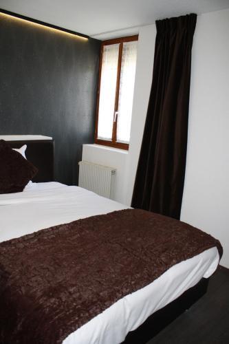 Foto de una habitación de Hotel de la Gare