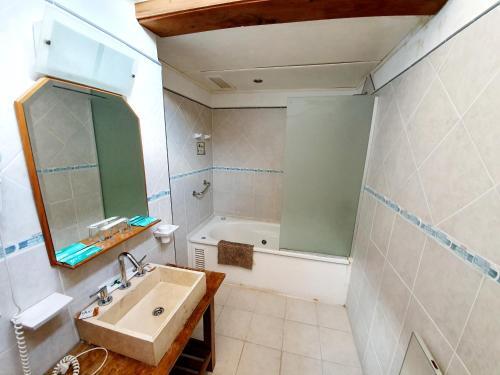 Foto del baño de Hotel La Cumbrecita